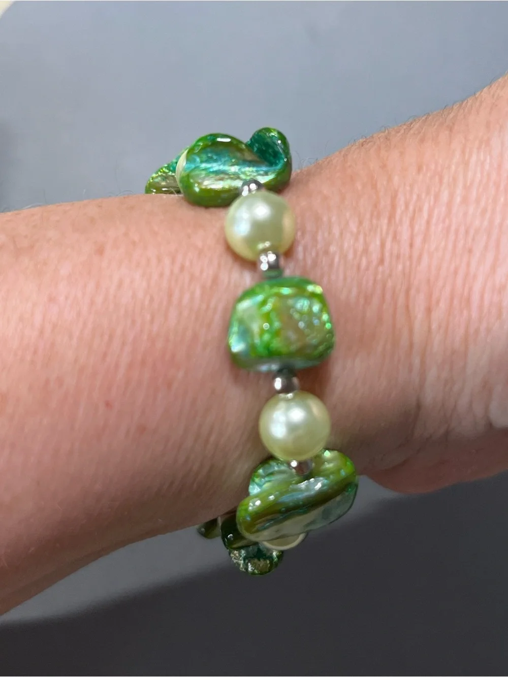 NWOT lovely green bead & pearl looking bead bracelet.  Comfortably fits 7” wrist